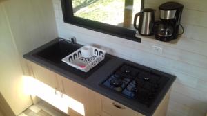 Hebergement la tiny house de l'aa : photos des chambres