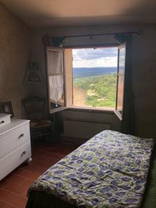 Hebergement Maison de village : photos des chambres
