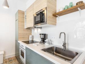 Appartement Welkeys - Rois Apartment : photos des chambres