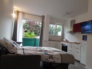 Appartement Cosy Apartment : photos des chambres