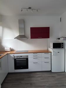Appartement Cosy Apartment : photos des chambres