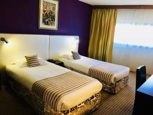 Grand Hotel de Nimes : photos des chambres