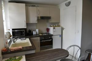 Appartement Studio Saint Louis : photos des chambres