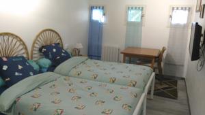 Hebergement AU PIED DU CANIGOU- Gite 4 etoiles dans belle villa avec jardin : photos des chambres