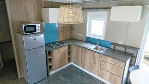 Hebergement Camping Les Framboiseilles : photos des chambres