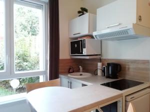 Appartement Chic studio in Paris : photos des chambres