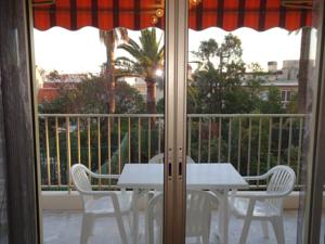 Appartement Immeuble le Palm Flor : photos des chambres