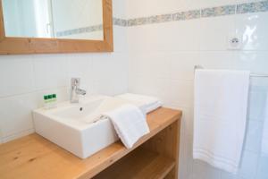 Hebergement Village de gites Les Chalets de l'Aubrac : photos des chambres