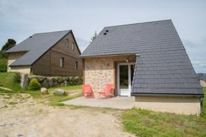 Hebergement Village de gites Les Chalets de l'Aubrac : photos des chambres