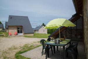Hebergement Village de gites Les Chalets de l'Aubrac : photos des chambres