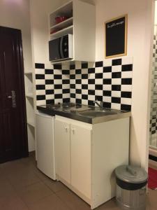 Appartement Le Studio des Artistes : photos des chambres