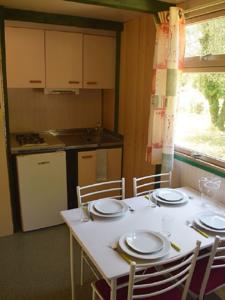 Hebergement Village de Chalets de Rocamadour : photos des chambres