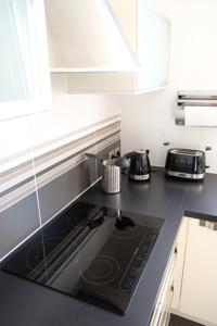 Appartement Le Petit Buc : photos des chambres
