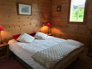 Hebergement Chalet L'Outarde : photos des chambres