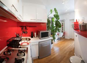 Appartement Hibiscus Apartments : photos des chambres
