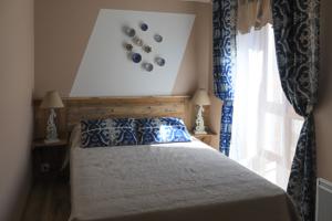 Appartement T2 centre ville clim et parking : photos des chambres