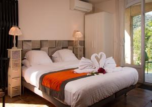 Appartement Harmonice & Spa : photos des chambres