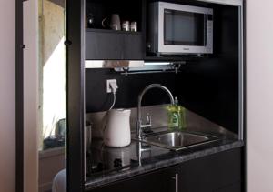 Appartement Harmonice & Spa : photos des chambres