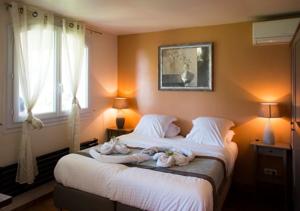 Appartement Harmonice & Spa : photos des chambres