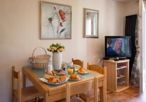 Appartement Harmonice & Spa : photos des chambres