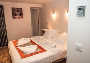 Appartement Harmonice & Spa : photos des chambres