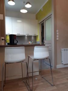 Appartement Au coeur du Bourget, A quelques minutes de Paris : studio en rez de jardin, semi privatif. : photos des chambres