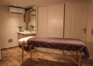 Appartement Harmonice & Spa : photos des chambres