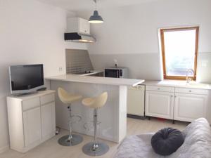 Appartement Deux pieces a Cabourg-Plage. Entre thalasso et mer, les sejours d'Heloise : photos des chambres