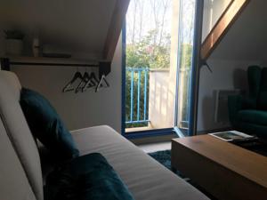 Appartement Au Gre Du Vent : photos des chambres