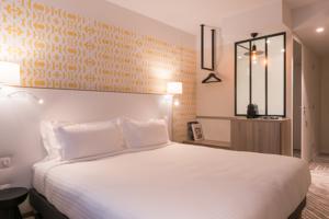 Hotel The Originals Paris Maison Montmartre (ex Qualys-Hotel) : photos des chambres