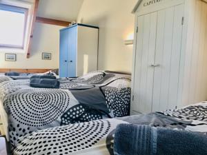 Appartement Maison Les Algues : photos des chambres