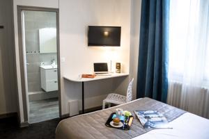 Hotel De La Pommeraie : photos des chambres