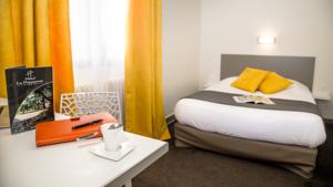 Hotel De La Pommeraie : photos des chambres