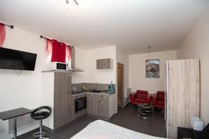 Appartement Studio centre ville avec parking : photos des chambres