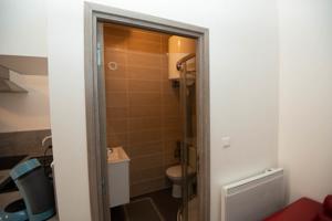 Appartement Studio centre ville avec parking : photos des chambres