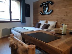 Appartement Le Grizzly Luxe Location : photos des chambres