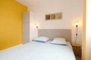 Bel appartement cosy : photos des chambres