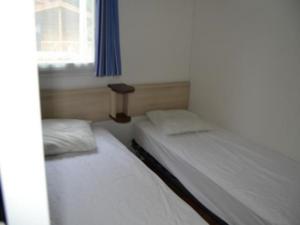 Hebergement Camping du Lac de la Seigneurie : photos des chambres