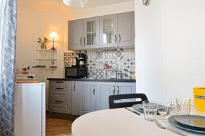 Appartement Le Petit Palais : photos des chambres