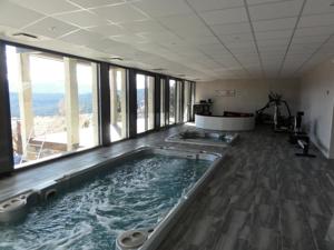 Appartement Chalet 7 pieces 18 pers vue exceptionnelle, classe 5* en meuble de tourisme et espace balneo detente sportif 79104 : photos des chambres