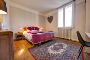 Appartement Le Millesime : photos des chambres