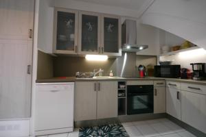 Appartement Le Millesime : photos des chambres
