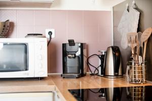 Appartement Beau Studio : photos des chambres