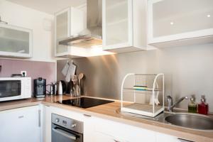 Appartement Beau Studio : photos des chambres