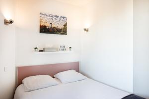 Appartement Beau Studio : photos des chambres
