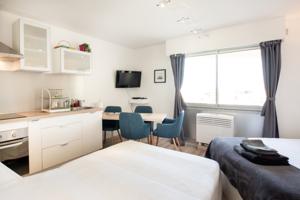 Appartement Beau Studio : photos des chambres