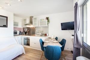 Appartement Beau Studio : photos des chambres