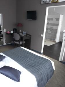 Hotel Hostellerie de la Quenoeuille : photos des chambres