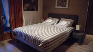 Hebergement Le Fraisy Location de Vacances : photos des chambres