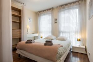Appartement Central et Gare + Garage : photos des chambres